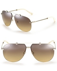 Chic rimless aviator sunglasses with an ivory-toned top bar and arms for eye-catching style. Chic rimless aviator sunglasses with an ivory-toned top bar and arms for eye-catching style.