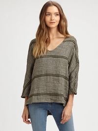 A mid-weight blend of linen and cotton, draped and slouchy with yarn-dyed stripes.V-neckDropped shouldersThree-quarter sleevesHi-lo hemAbout 25 from shoulder to hem63% linen/37% cottonMachine washImportedModel shown is 5'8½ (174cm) wearing US size Small. A mid-weight blend of linen and cotton, draped and slouchy with yarn-dyed stripes.V-neckDropped shouldersThree-quarter sleevesHi-lo hemAbout 25 from shoulder to hem63% linen/37% cottonMachine washImportedModel shown is 5'8½ (174cm) wearing US size Small.