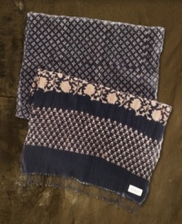 This airy open-worked cotton scarf adds cool contrast to any look with its rugged foliage block print and fringed ends. This airy open-worked cotton scarf adds cool contrast to any look with its rugged foliage block print and fringed ends.
