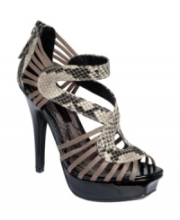 Work. It. Material Girl's Diva platform sandals are sexy with contrasting straps. They'll instantly transform even the most simplest outfit into something extraordinary. Work. It. Material Girl's Diva platform sandals are sexy with contrasting straps. They'll instantly transform even the most simplest outfit into something extraordinary.