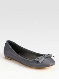 Sophisticated leather flat with grosgrain trim and a dainty bow. Leather upperLeather lining and solePadded insoleImportedOUR FIT MODEL RECOMMENDS ordering true size. Sophisticated leather flat with grosgrain trim and a dainty bow. Leather upperLeather lining and solePadded insoleImportedOUR FIT MODEL RECOMMENDS ordering true size.