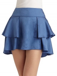 Wrap-around ruffles in shimmering silk, with a hem that dips slightly lower in back.Wide set-on waistband Ruffled detail Back hook and zipper closure About 15½ long Silk; dry clean Imported Wrap-around ruffles in shimmering silk, with a hem that dips slightly lower in back.Wide set-on waistband Ruffled detail Back hook and zipper closure About 15½ long Silk; dry clean Imported