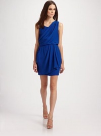 A rich silk style fit for a goddess with feminine draped detail. Sleeveless Side buttons and zipper closure About 19 from natural waist Silk; dry clean Imported A rich silk style fit for a goddess with feminine draped detail. Sleeveless Side buttons and zipper closure About 19 from natural waist Silk; dry clean Imported