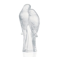 From Lalique in stunning solid cut and matte crystal, the Two Parakeets are a gentle symbol of affection. From Lalique in stunning solid cut and matte crystal, the Two Parakeets are a gentle symbol of affection.