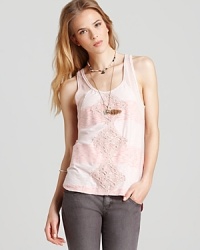 Dreams of lovely, effortless style become a reality with this Free People Dreamsicle tank, with embroidered detailing, sheer sides and a trend-right high/low hem. Dreams of lovely, effortless style become a reality with this Free People Dreamsicle tank, with embroidered detailing, sheer sides and a trend-right high/low hem.