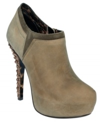 Suede up top, with glitter and studs on the heel. The Vivian platform booties by Betsey Johnson make any look that much more intriguing. Suede up top, with glitter and studs on the heel. The Vivian platform booties by Betsey Johnson make any look that much more intriguing.