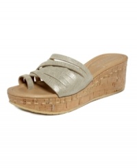 Easy elegance. The Sheena wedge sandals by Donald J Pliner are the definition of summer chic with their slip-on profile in modern, metallic leather. Easy elegance. The Sheena wedge sandals by Donald J Pliner are the definition of summer chic with their slip-on profile in modern, metallic leather.