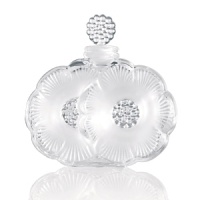 Designed in 1935 by Rene Lalique, this iconic flacon features delicate flowers in full bloom/ Designed in 1935 by Rene Lalique, this iconic flacon features delicate flowers in full bloom/
