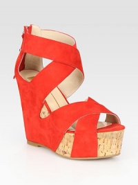 Soft suede criss-cross straps set on an earthy cork wedge, concluded by an exposed back zipper. Cork and suede wedge, 5 (125mm)Cork and suede platform, 1½ (40mm)Compares to a 3½ heel (90mm)Suede upperExposed back zipperLeather liningRubber solePadded insoleImportedOUR FIT MODEL RECOMMENDS ordering true size. Soft suede criss-cross straps set on an earthy cork wedge, concluded by an exposed back zipper. Cork and suede wedge, 5 (125mm)Cork and suede platform, 1½ (40mm)Compares to a 3½ heel (90mm)Suede upperExposed back zipperLeather liningRubber solePadded insoleImportedOUR FIT MODEL RECOMMENDS ordering true size.