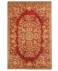 Rich in both tone and tradition, this exquisite Safavieh area rug creates a unforgettable focal point with a vine-and-blossom motif that coils beautifully against a striking red background. Tufted in India from pure wool, this rug adds incredible allure to any space. (Clearance) Rich in both tone and tradition, this exquisite Safavieh area rug creates a unforgettable focal point with a vine-and-blossom motif that coils beautifully against a striking red background. Tufted in India from pure wool, this rug adds incredible allure to any space. (Clearance)