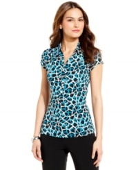 A bold update on the essential preppy polo, this Alfani top radiates modern style in a vivid graphic print. Classic accessories and basic black pants provide a perfect foundation for this statement-making look. A bold update on the essential preppy polo, this Alfani top radiates modern style in a vivid graphic print. Classic accessories and basic black pants provide a perfect foundation for this statement-making look.
