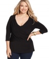 Look slim and sassy in Elementz' three-quarter-sleeve plus size top, featuring a shaping panel!