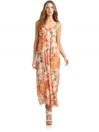 THE LOOKAllover floral printSurplice V-neck and backEmpire waistSide zip closureTHE FITAbout 53 from shoulder to hemTHE MATERIALSilkCARE & ORIGINMachine washImportedModel shown is 5'10½ (179cm) wearing US size 4. THE LOOKAllover floral printSurplice V-neck and backEmpire waistSide zip closureTHE FITAbout 53 from shoulder to hemTHE MATERIALSilkCARE & ORIGINMachine washImportedModel shown is 5'10½ (179cm) wearing US size 4.