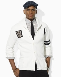 A throwback to preppy athletic style with sporty details and a handsome shawl collar, this timeless fleece cardigan looks just as good at sporting events as it does in the workplace. A throwback to preppy athletic style with sporty details and a handsome shawl collar, this timeless fleece cardigan looks just as good at sporting events as it does in the workplace.