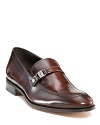 A true classic, this laquered leather loafer finishes your professional look with steady grace and surperb craftmanship.
