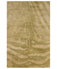 Not your everyday animal print, this distinctive rug interprets a classic motif into a chic, contemporary design. The Serengeti rug is hand-tufted of plush wool, creating a durable piece with an incredibly soft hand. Not your everyday animal print, this distinctive rug interprets a classic motif into a chic, contemporary design. The Serengeti rug is hand-tufted of plush wool, creating a durable piece with an incredibly soft hand.