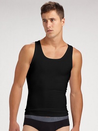 The classic crew is redefined in high-stretch cotton that firms the chest as it flattens the stomach. Crewneck Improves posture Supports lower back No bulk under clothing Tapered shape 81% cotton/19% spandex; machine wash Imported The classic crew is redefined in high-stretch cotton that firms the chest as it flattens the stomach. Crewneck Improves posture Supports lower back No bulk under clothing Tapered shape 81% cotton/19% spandex; machine wash Imported