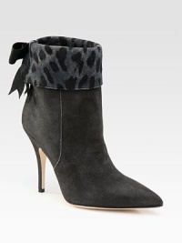 Suede, point-toe style with an exotic faux-fur cuff that ends with a sweet bow at the back. Self-covered heel, 4 (100mm) Suede upper Leather lining Buffed leather sole Padded insole 72% acrylic/28% cotton faux-fur cuff Made in ItalyOUR FIT MODEL RECOMMENDS ordering one size up as this style runs small. Suede, point-toe style with an exotic faux-fur cuff that ends with a sweet bow at the back. Self-covered heel, 4 (100mm) Suede upper Leather lining Buffed leather sole Padded insole 72% acrylic/28% cotton faux-fur cuff Made in ItalyOUR FIT MODEL RECOMMENDS ordering one size up as this style runs small.
