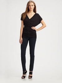 Luxe jersey skims the body in a softly-ruched V-neck.Dropped shouldersShort sleevesCenter ruchingAbout 28 from shoulder to hem94% rayon/6% spandexDry cleanMade in USA Luxe jersey skims the body in a softly-ruched V-neck.Dropped shouldersShort sleevesCenter ruchingAbout 28 from shoulder to hem94% rayon/6% spandexDry cleanMade in USA