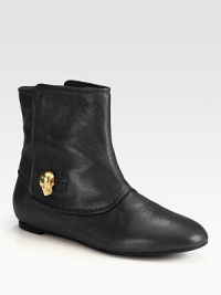 A gleaming goldtone skull adds signature style to this ultra-soft leather ankle boot. Leather upperPull-on styleLeather lining and solePadded insoleMade in Italy A gleaming goldtone skull adds signature style to this ultra-soft leather ankle boot. Leather upperPull-on styleLeather lining and solePadded insoleMade in Italy