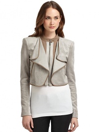 THE LOOKCropped silhouettePadded shouldersDraped, cascading frontZip closureAngled welt pocketsTHE FITAbout 17 from shoulder to hemTHE MATERIALShell: polyester/spandexSecond fabric: cotton/nylonThird fabric: rayon/nylon/spandexFully linedCARE & ORIGINDry cleanImportedModel shown is 5'10 (177cm) wearing US size Small. THE LOOKCropped silhouettePadded shouldersDraped, cascading frontZip closureAngled welt pocketsTHE FITAbout 17 from shoulder to hemTHE MATERIALShell: polyester/spandexSecond fabric: cotton/nylonThird fabric: rayon/nylon/spandexFully linedCARE & ORIGINDry cleanImportedModel shown is 5'10 (177cm) wearing US size Small.