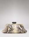 Add a flash of skin to an elegant night out with an Overture Judith Leiber clutch in printed Italian leather. Gleaming bands frame the edges, while a bold pushlock guards the essentials.