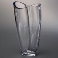 The joyful grace of nature's most precious creatures comes alive in the refreshing Butterfly collection from Nambé. With a sweeping, romantic style and purposeful construction, this fine vase lends cheer to any setting. Designed by Neil Cohen for Nambé. The joyful grace of nature's most precious creatures comes alive in the refreshing Butterfly collection from Nambé. With a sweeping, romantic style and purposeful construction, this fine vase lends cheer to any setting. Designed by Neil Cohen for Nambé.