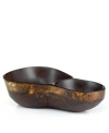 Naturally brilliant. This lightweight chip and dip is carved from the wood of an obeche tree, a fast-growing, renewable species found in the Haitian mountains. A natural lacquer finish makes each one-of-a-kind piece suitable for hot and cold foods. By artist Einstein Albert for Heart of Haiti's collection of serveware and serving dishes.