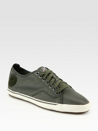 Best paired against the neutral tones in your wardrobe, this casual classic is destined to be a wardrobe favorite.Canvas upperPadded insoleRubber soleImported Best paired against the neutral tones in your wardrobe, this casual classic is destined to be a wardrobe favorite.Canvas upperPadded insoleRubber soleImported