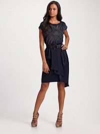 Edgy two-tone studs balance out the soft draping of this lustrous satin style, cinched with an elastic web belt.Bateau neckline Studded bodice Asymmetrical draped panel at the hip Elastic web belt with snaps Back zipper About 48 from shoulder to hem Polyester; dry clean Imported Edgy two-tone studs balance out the soft draping of this lustrous satin style, cinched with an elastic web belt.Bateau neckline Studded bodice Asymmetrical draped panel at the hip Elastic web belt with snaps Back zipper About 48 from shoulder to hem Polyester; dry clean Imported