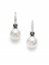 THE LOOKMother of pearl and black cubic zirconia accentsCurved setting with cubic zirconia detailsSterling silver rhodium-plated settingHook closureTHE MEASUREMENTLength, about 1¼ORIGINImported THE LOOKMother of pearl and black cubic zirconia accentsCurved setting with cubic zirconia detailsSterling silver rhodium-plated settingHook closureTHE MEASUREMENTLength, about 1¼ORIGINImported