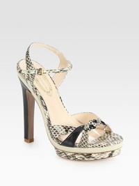 Snake-print leather style an adjustable ankle strap, island platform and a contrasting heel. Self-covered heel, 5½ (140mm)Island platform, 1 (25mm)Compares to a 4½ heel (115mm)Snake-print leather upperLeather lining and solePadded insoleImportedOUR FIT MODEL RECOMMENDS ordering one size up as this style runs small. Snake-print leather style an adjustable ankle strap, island platform and a contrasting heel. Self-covered heel, 5½ (140mm)Island platform, 1 (25mm)Compares to a 4½ heel (115mm)Snake-print leather upperLeather lining and solePadded insoleImportedOUR FIT MODEL RECOMMENDS ordering one size up as this style runs small.