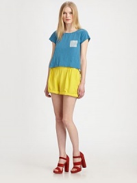 A lightweight two-tone design crafted of pure cotton, finished with an adorable patch pocket. JewelneckShort cap sleevesContrasting patch pocketContrasting back with center pleatAbout 19½ from shoulder to hemCottonHand washImported of USA fabricModel shown is 5'10 (177cm) wearing US size Small. A lightweight two-tone design crafted of pure cotton, finished with an adorable patch pocket. JewelneckShort cap sleevesContrasting patch pocketContrasting back with center pleatAbout 19½ from shoulder to hemCottonHand washImported of USA fabricModel shown is 5'10 (177cm) wearing US size Small.