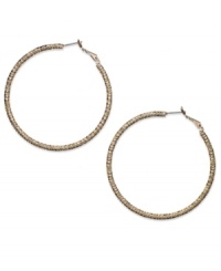 This time with feeling. INC International Concepts' large hoop earrings, crafted from gold-tone mixed metal, are textured to give them a different stylish sensation. Approximate diameter: 2-1/4 inches. This time with feeling. INC International Concepts' large hoop earrings, crafted from gold-tone mixed metal, are textured to give them a different stylish sensation. Approximate diameter: 2-1/4 inches.