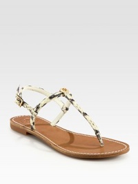 Skinny watersnake straps surround the foot and conclude with an adjustable slingback, thong front and goldtone designer emblem. Watersnake upperLeather liningRubber soleImported Skinny watersnake straps surround the foot and conclude with an adjustable slingback, thong front and goldtone designer emblem. Watersnake upperLeather liningRubber soleImported
