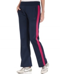 Nike's classic track pants are easy essentials for the gym. Pair them with the matching jacket for an iconic athletic look! Nike's classic track pants are easy essentials for the gym. Pair them with the matching jacket for an iconic athletic look!