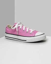 Low cut Converse All Stars. This classic canvas sneaker set the standard in cool and comfort. Available in kids sizes. With lace-up canvas uppers, contrast stitching and rubber sole and toe. Low cut Converse All Stars. This classic canvas sneaker set the standard in cool and comfort. Available in kids sizes. With lace-up canvas uppers, contrast stitching and rubber sole and toe.