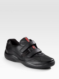 Hook-and-tab closure with nylon logo detail. Padded insole Rubber sole Imported Hook-and-tab closure with nylon logo detail. Padded insole Rubber sole Imported