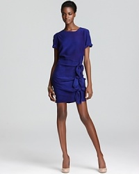 A silhouette knot to be believed, this Gryphon mini dress marries a gorgeous jewel tone, elegant details and luxurious silk for haute style you can take to drinks, dinner and dancing. A silhouette knot to be believed, this Gryphon mini dress marries a gorgeous jewel tone, elegant details and luxurious silk for haute style you can take to drinks, dinner and dancing.