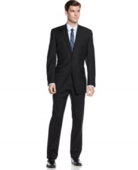 Pinstripes take this Calvin Klein power suit to the next level. Pinstripes take this Calvin Klein power suit to the next level.