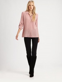 The classic button-down blouse with a touch of luxury, thanks to its silk fabrication. Collar neckRoll-tab sleevesButton frontBack yokeAbout 28 from shoulder to hemSilkDry cleanImported Model shown is 5'10 (177cm) wearing US size Small. The classic button-down blouse with a touch of luxury, thanks to its silk fabrication. Collar neckRoll-tab sleevesButton frontBack yokeAbout 28 from shoulder to hemSilkDry cleanImported Model shown is 5'10 (177cm) wearing US size Small.