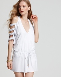 Play peek-a-boo with this v neck cover up from PilyQ. With a drop waist and dramatic detailing, this dress shows just enough skin to get you noticed. Play peek-a-boo with this v neck cover up from PilyQ. With a drop waist and dramatic detailing, this dress shows just enough skin to get you noticed.