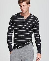 Nautical stripes give this Henley a sense of adventure - and style. Nautical stripes give this Henley a sense of adventure - and style.