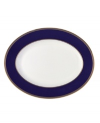Embellished with intricate garlands, oval links and a fanciful dragon motif, this Wedgwood dinnerware evokes Europe's glorious Renaissance period. Rendered in deep blue and gold to transform any formal meal into a spectacular royal gala. Embellished with intricate garlands, oval links and a fanciful dragon motif, this Wedgwood dinnerware evokes Europe's glorious Renaissance period. Rendered in deep blue and gold to transform any formal meal into a spectacular royal gala.