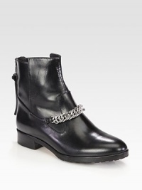 Street-ready kicks made of sumptuous leather and topped with a gleaming metal chain. Stacked heel, 1 (25mm)Leather upper with metal chain detailBack zipLeather liningRubber solePadded insoleImported Street-ready kicks made of sumptuous leather and topped with a gleaming metal chain. Stacked heel, 1 (25mm)Leather upper with metal chain detailBack zipLeather liningRubber solePadded insoleImported