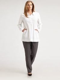 The perfect wear-everywhere piece, finished with side slash pockets and delicate gathered details.Shirt collarButton placket with gathered detailSide slash pocketsLong sleeves with button cuffsGathers at back yokeAbout 32 from shoulder to hem62% linen/36% viscose/2% spandexDry cleanImported of Italian fabric The perfect wear-everywhere piece, finished with side slash pockets and delicate gathered details.Shirt collarButton placket with gathered detailSide slash pocketsLong sleeves with button cuffsGathers at back yokeAbout 32 from shoulder to hem62% linen/36% viscose/2% spandexDry cleanImported of Italian fabric