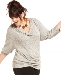 Sparkle this season in American Rag's three-quarter-sleeve plus size sweater, fashioned from a metallic knit. Sparkle this season in American Rag's three-quarter-sleeve plus size sweater, fashioned from a metallic knit.