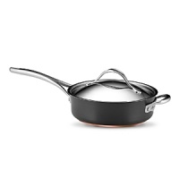 This Nouvelle cookware collection from Anolon features hard-anodized construction in a versatile, elegant shape for perfectly even heating and exceptional cooking performance. Each piece is designed with a double full cap base with a copper core for optimum heat control, and two layers of ultradurable aluminum. Restaurant-tested Autograph® 2 nonstick interiors ensure easy, clean release, and cast stainless-steel handles secured with sturdy dual rivets make each piece easy to maneuver and transport. This Nouvelle cookware collection from Anolon features hard-anodized construction in a versatile, elegant shape for perfectly even heating and exceptional cooking performance. Each piece is designed with a double full cap base with a copper core for optimum heat control, and two layers of ultradurable aluminum. Restaurant-tested Autograph® 2 nonstick interiors ensure easy, clean release, and cast stainless-steel handles secured with sturdy dual rivets make each piece easy to maneuver and transport.