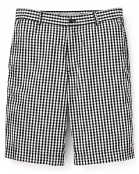 Classic gingham dresses up a timeless pair of flat front shorts from Michael Kors. Classic gingham dresses up a timeless pair of flat front shorts from Michael Kors.