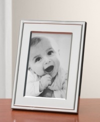This silver-plated frame displays the understated elegance of Waterford. Makes a thoughtful gift. This silver-plated frame displays the understated elegance of Waterford. Makes a thoughtful gift.